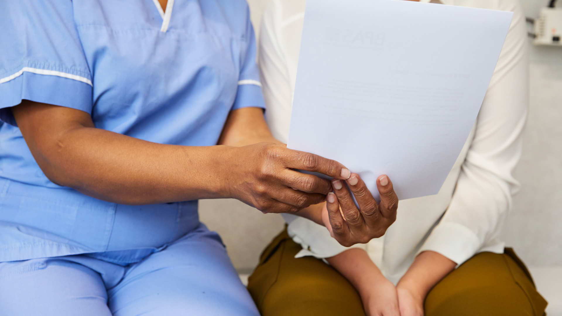 Nurse talking to client
