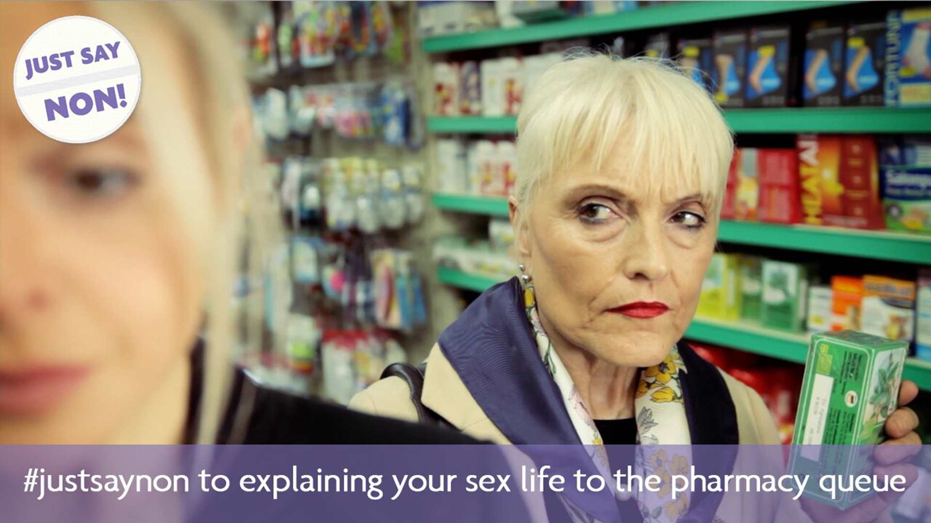 Woman giving judgemental look at a woman at a pharmacy